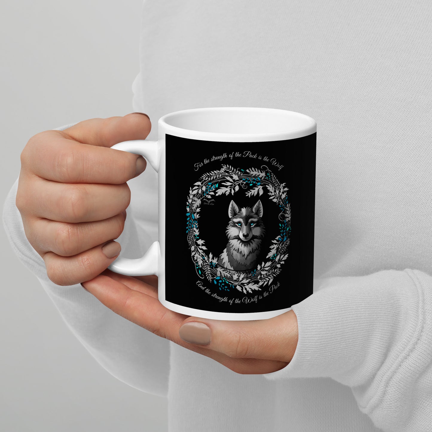 stormseye design silver winter wolf black coffee mug modelled