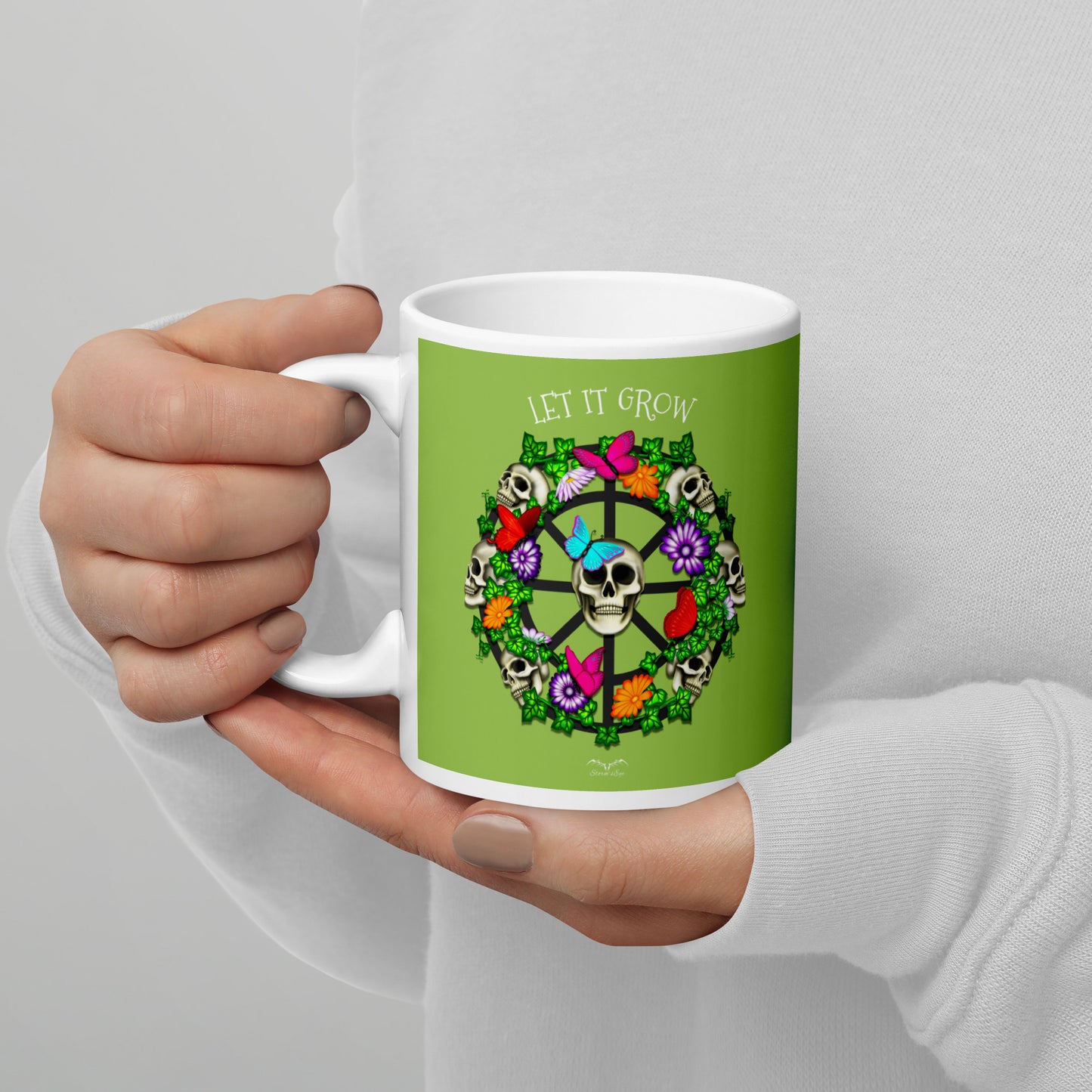 stormseye design skulls and flowers coffee mug green modelled view